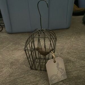 Hanging bird in a cage decoration